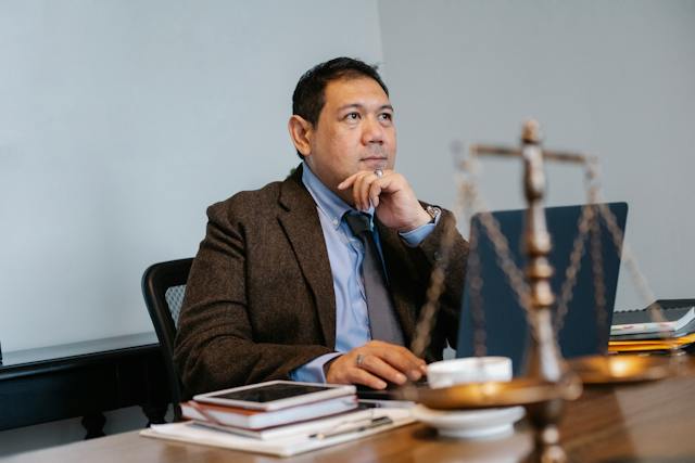 lawyer sitting at desk